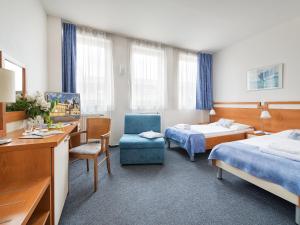 Postel nebo postele na pokoji v ubytování EA Hotel Populus