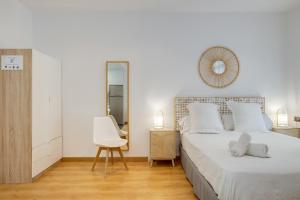 Posteľ alebo postele v izbe v ubytovaní Feelathome Center Apartments