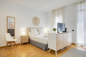 Posteľ alebo postele v izbe v ubytovaní Feelathome Center Apartments + 37 fotografií