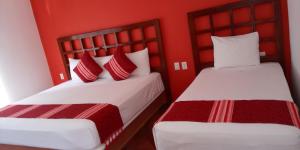 Postel nebo postele na pokoji v ubytování Hotel D Abril