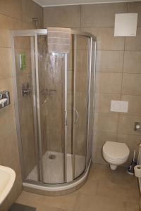 Koupelna v ubytování Garni Hotel Schmaus