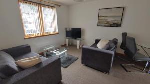 A seating area at Superb 2 Bedroom Flat