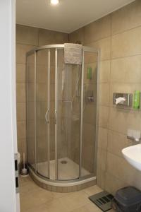 Koupelna v ubytování Garni Hotel Schmaus