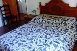 Lunarejo 2 reserva con seña tesisinde bir odada yatak veya yataklar