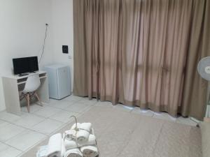 A television and/or entertainment centre at B&b il Girasole
