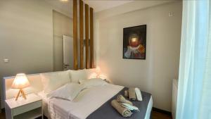 Posteľ alebo postele v izbe v ubytovaní Acropolis Slow Living apt under the Parthenon