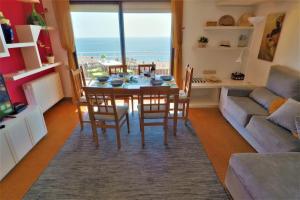 A seating area at Carmen Seaview & Beach - Apartment