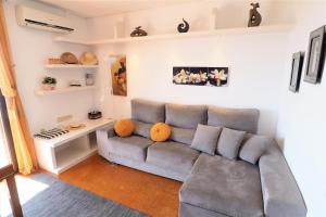 A seating area at Carmen Seaview & Beach - Apartment