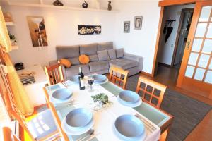 A seating area at Carmen Seaview & Beach - Apartment