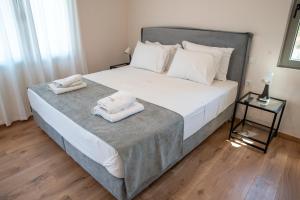 Posteľ alebo postele v izbe v ubytovaní Horizon Villa Almyrida