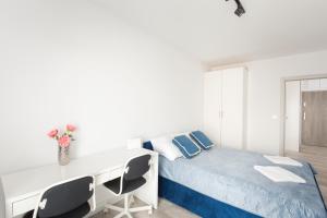 Ein Bett oder Betten in einem Zimmer der Unterkunft Apartament Balticus Deluxe