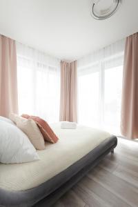 Posteľ alebo postele v izbe v ubytovaní Apartament Balticus Deluxe