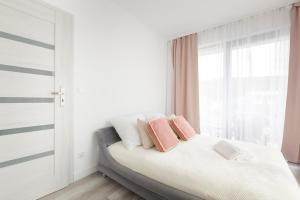 Posteľ alebo postele v izbe v ubytovaní Apartament Balticus Deluxe