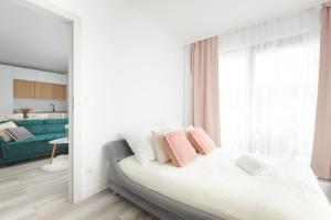 Posteľ alebo postele v izbe v ubytovaní Apartament Balticus Deluxe
