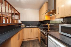 A kitchen or kitchenette at Woodside of Glasslaw 