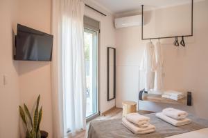Posteľ alebo postele v izbe v ubytovaní Horizon Villa Almyrida