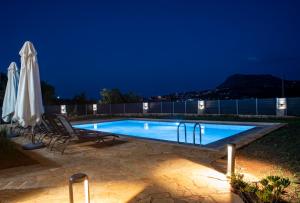 Bazén v ubytovaní Horizon Villa Almyrida alebo v jeho blízkosti