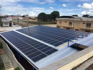 a roof with solar panels on top of a building at Minas Palace Hotel in Passos