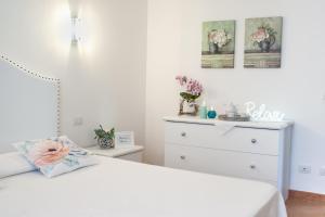 Postel nebo postele na pokoji v ubytování I Sicomori - Seme di Carota - Glamping e appartamenti con piscina a Saturnia