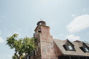 a building with a clock tower on top of it at The Winston Solvang in Solvang