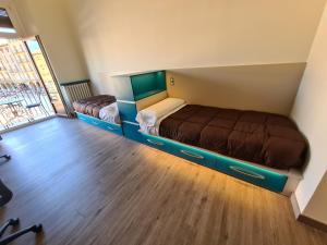Postel nebo postele na pokoji v ubytování Apartaments Vicus 3 con vistas a la Plaza Mayor de Vic