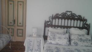 Posteľ alebo postele v izbe v ubytovaní Villa Di Miscio + 24 fotografií