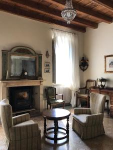 Posezení v ubytování B&B Corte Seguini