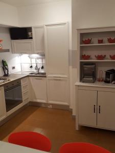 Kuchyň nebo kuchyňský kout v ubytování B&B RUFHOUSE