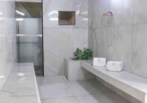 Koupelna v ubytování Inkari Suites Hotel