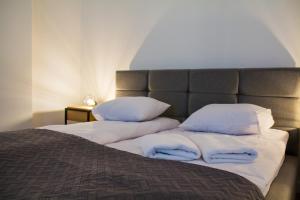 Кровать или кровати в номере Ósemka