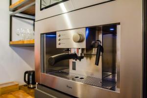 Una cocina o cocineta en Ósemka by Rentoom