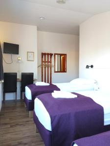 Voodi või voodid majutusasutuse The Vík Inn by Ourhotels toas