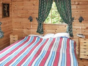 Postel nebo postele na pokoji v ubytování Two-Bedroom Holiday home in Brekke