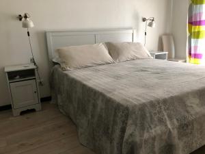 Postel nebo postele na pokoji v ubytování Cosmopolitan Palermo