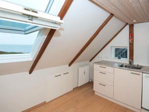 a kitchen with a sink and a window at 4 person holiday home in Esbjerg V in Esbjerg