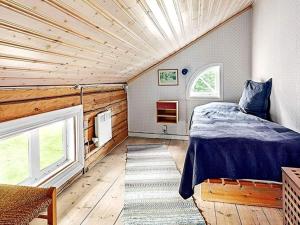 Postel nebo postele na pokoji v ubytování Holiday home SKILLINGARYD