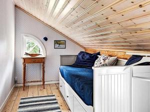 Postel nebo postele na pokoji v ubytování Holiday home SKILLINGARYD