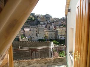 a view of a city from an apartment balcony at Casa Giordano in Guardavalle