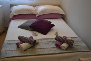 Postel nebo postele na pokoji v ubytování Miriam Rooms Zadar