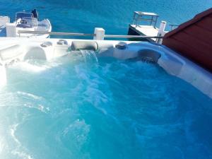 a swimming pool on a boat in the water at 6 person holiday home in Gursken-By Traum in Larsnes