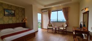 Giường trong phòng chung tại Hoang Yen Hotel