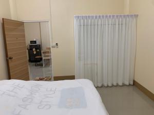 Postel nebo postele na pokoji v ubytování Tk Home 1