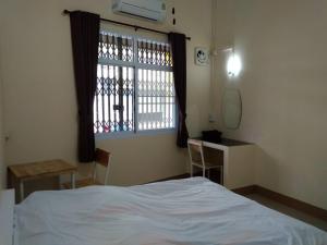 Postel nebo postele na pokoji v ubytování Tk Home 1