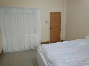 Postel nebo postele na pokoji v ubytování Tk Home 1