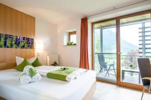 Postel nebo postele na pokoji v ubytování Hotel Alpenblick