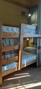 a couple of bunk beds in a room at Don-Antonio in Krasnodar