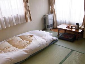 Cama o camas de una habitación en Moto-Hakone Guest House