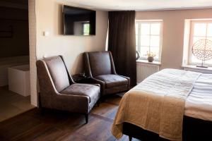 Postel nebo postele na pokoji v ubytování Hotell Visby Börs