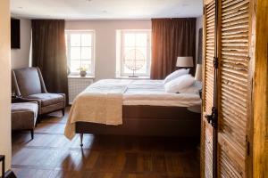 Postel nebo postele na pokoji v ubytování Hotell Visby Börs