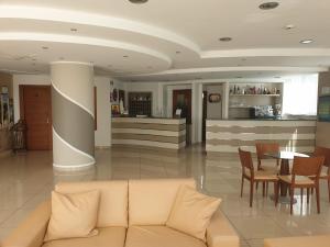 The lobby or reception area at Hotel Apulia